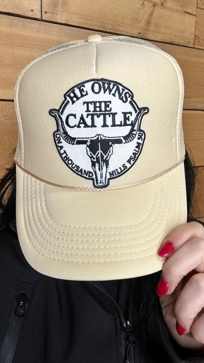 He Owns The Cattle Trucker Hat